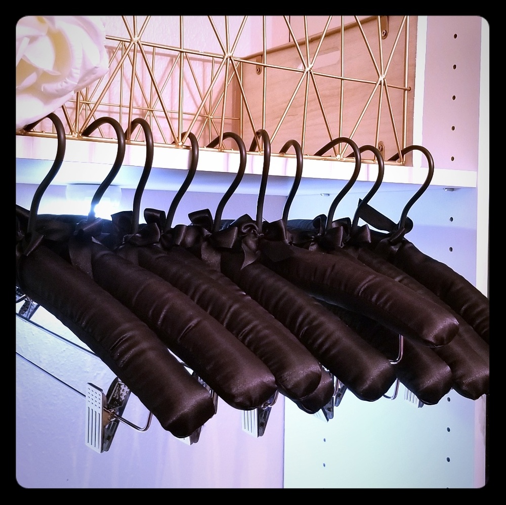 Black satin padded hangers with silver clips
